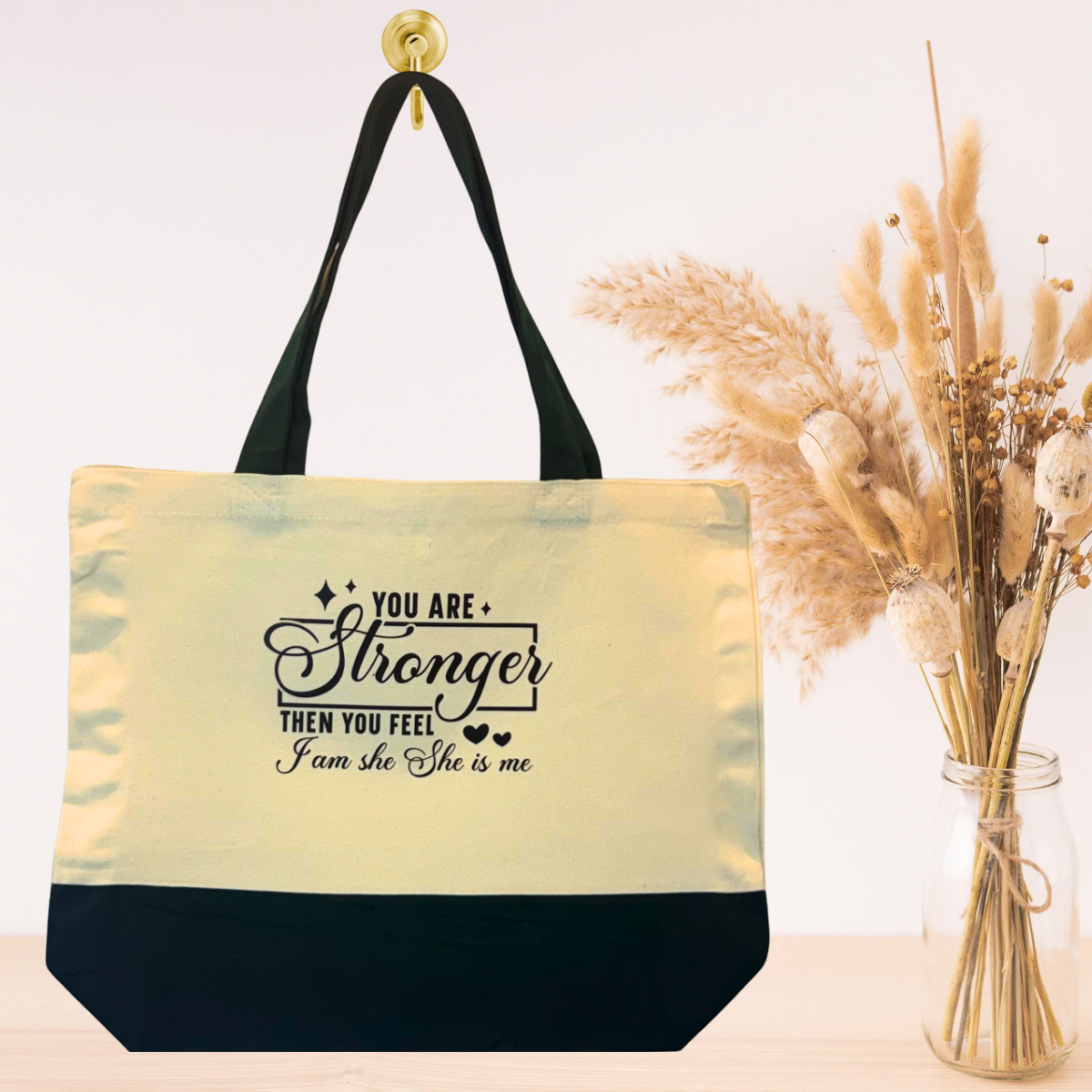 Green reusable canvas tote bag with motivational message print